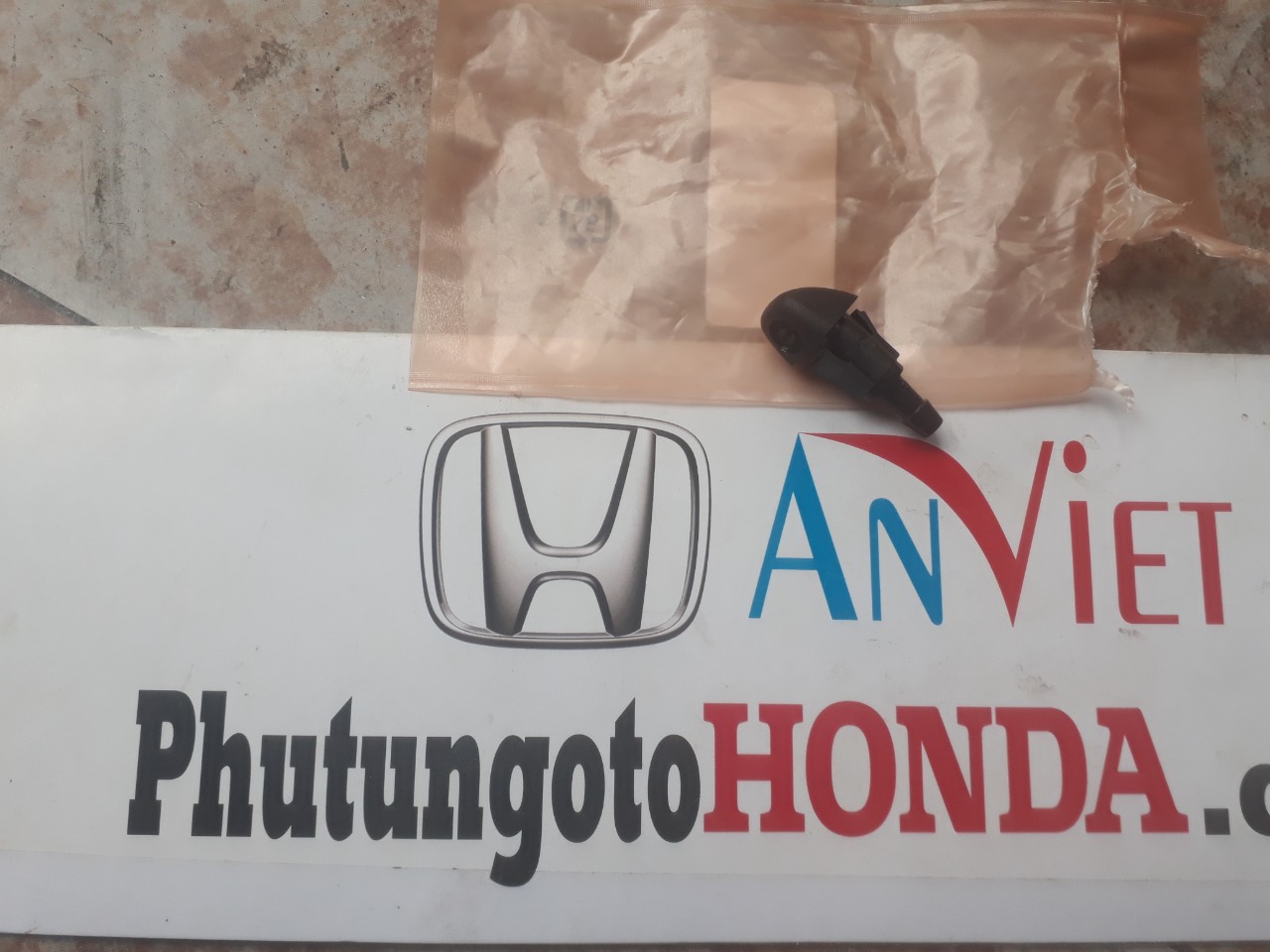 Voi phun nuoc rua kinh honda civic